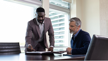 Businessmen in a discussion.